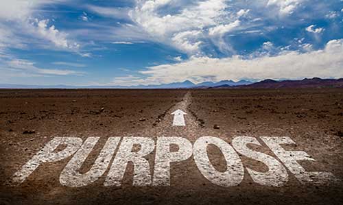 Text displaying the word 'purpose' with an arrow above it showing direction